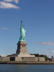 Fototapeta premium Statue of liberty on a sunny day NYC