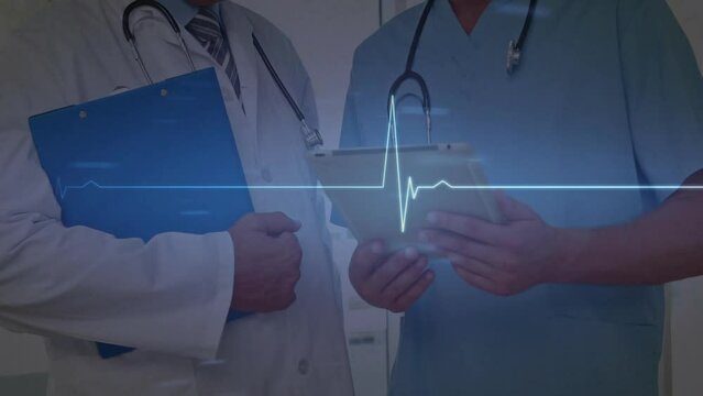Animation of heart rate monitor over diverse doctors