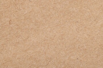 Texture of beige paper sheet as background, top view