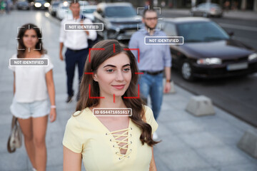 Obraz premium Facial recognition system identifying people on city street. Woman and her personal data