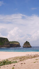 Fototapeta premium the charm of the beauty of the white sand and green hills of the Mandalika beach, Lombok, a comfortable place to vacation and relax