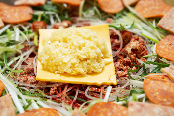 Stew made with ham, sausage, etc. budaejjigae