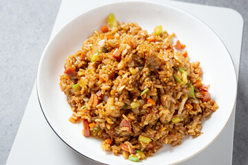 Sausage vegetable fried rice on plate