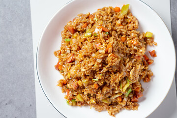 Sausage vegetable fried rice on plate