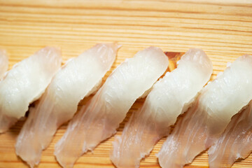 sushi on a wooden board