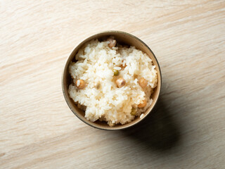 Well-cooked steamed rice in a brass bowl