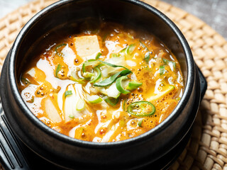 Soybean paste stew in an earthenware bowl, Korean food	