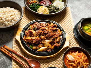 Stir-fried webfoot octopus, various vegetable bibimbap, and soybean paste stew