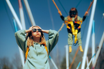 Overprotective Mother Feeling Stressed about Trampoline Safety. Preoccupied anxious mom worrying...