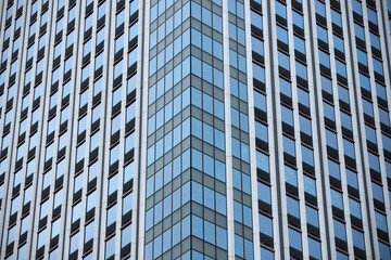 Fototapeta premium 東京都の高層オフィスビルの外壁の風景