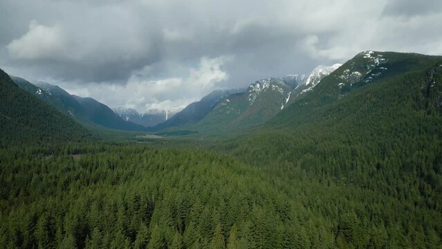 Aerial view of Canadian mountain landscape in cloudy day. Taken near Vancouver