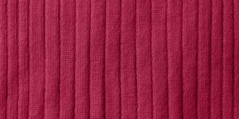 Fototapeta premium Knitted viva magenta fabric, closeup