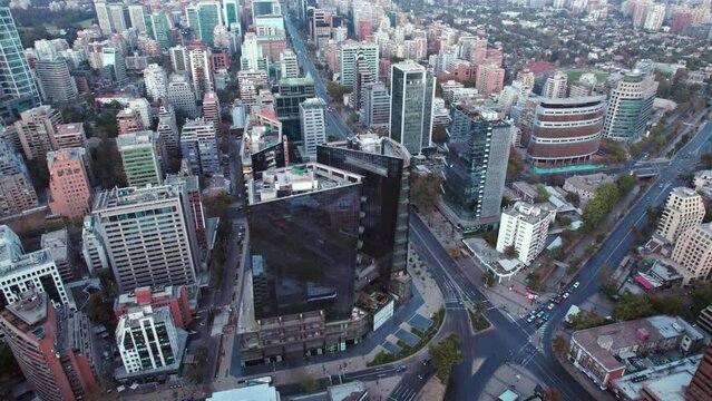 Aerial dolly shot overhead the financial district in Santiago, Chile. MUT (Mercado Urbano Tobalaba) integrated building