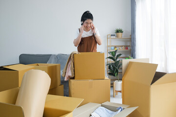 Modern female people in moving home apartment leisure indoor activity alone.