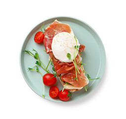 Plate with tasty egg Benedict isolated on white background