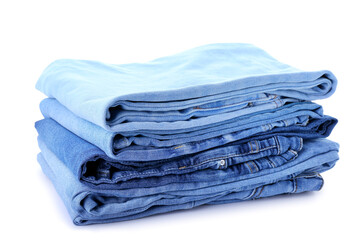 Stack of jeans on white background
