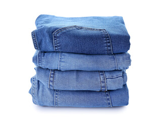 Stack of jeans on white background