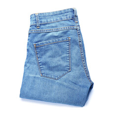 Folded jeans on white background