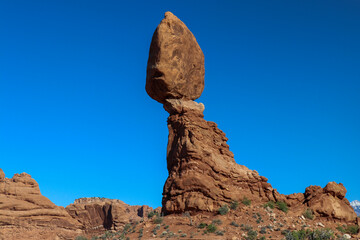 Fototapeta na wymiar This massive sandstone tower is known as the Balanced Rock and is a natures marvel located at the Arches National Park, Moab Utah