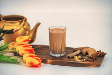 Indian masala chai tea. Masala chai spiced tea with milk and spices or karak chai or cutting chai....