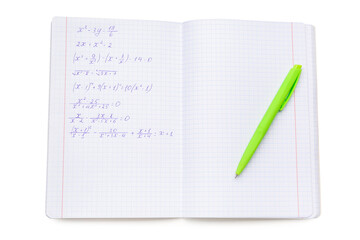 Copybook with maths formulas and pen isolated on white background