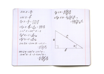 Copybook with maths formulas isolated on white background