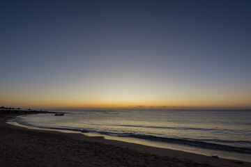 amazing colors from the sunrise at the sky and beach at the red sea