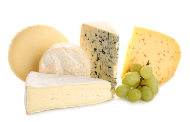 Different types of cheese with grapes and nuts isolated on white background