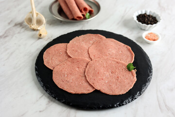 Beef Salami on Black Plate