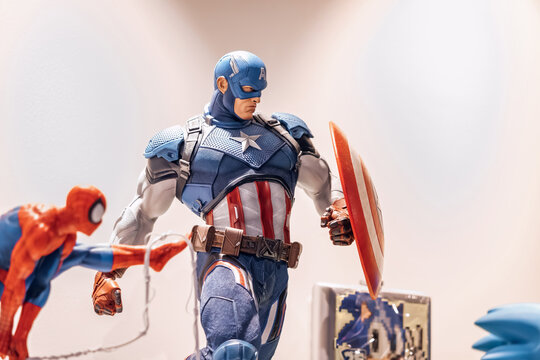 17 January 2023, Dubai, UAE: Captain America, Spiderman and other superheroes on the shelf of comics store