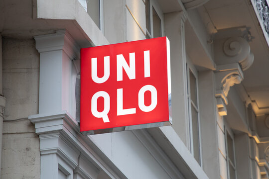 uniqlo shop sign text store brand logo Japanese casual wear chain designer manufacturer retailer fashion shop