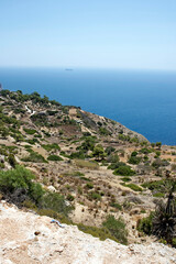 Rock and beautiful scenic view over Malta island with Mediterranean Sea in the background on a hot...