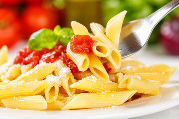 Plakat Penne Rigatoni Rigate eating pasta on fork meal from Italy lunch with tomato sauce on a plate
