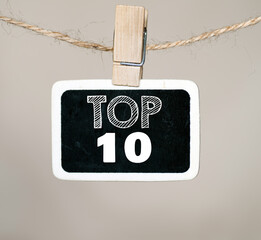 TOP 10 words on a small chalkboard.