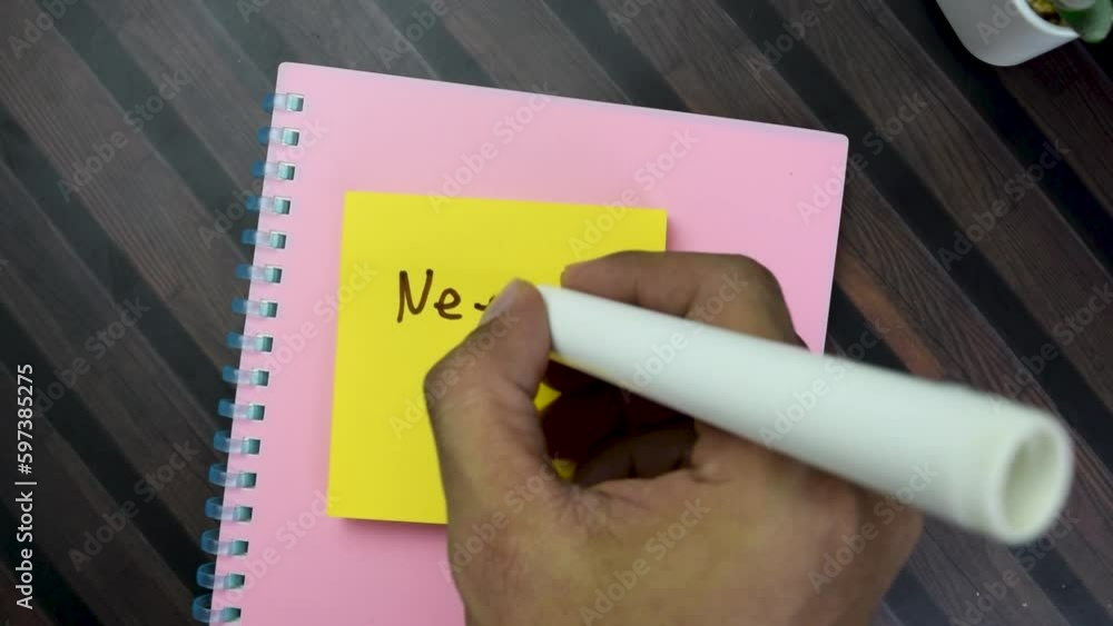 Poster concept of need work! write on sticky notes isolated on wooden table.