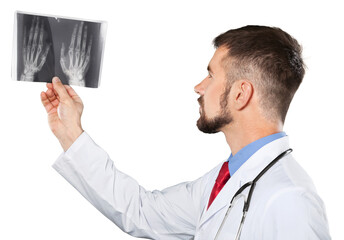 Man doctor or dentist looking at x-ray