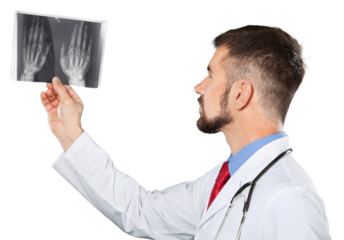 Man doctor or dentist looking at x-ray
