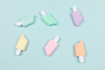 closeup of popsicles on cyan surface icecream