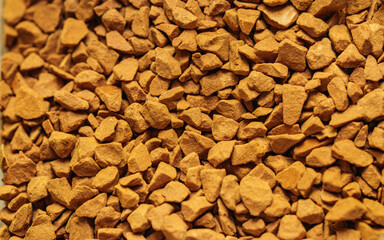Granulated coffee, beans in a bowl