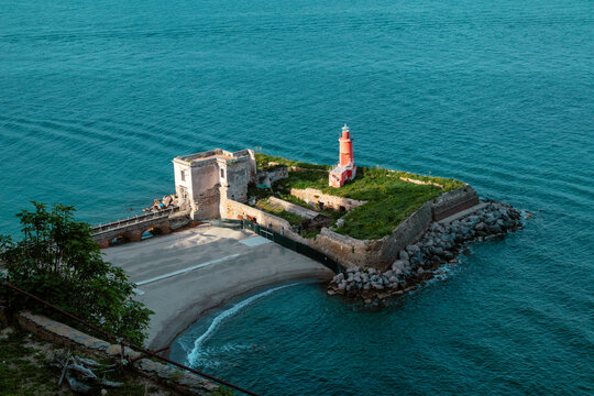 lighthouse of the bay castle. Baia beach. Naples, Italy. Tourism in Italy. Sea landscapes in Italy in Baia. Bacoli. vivid colors. Spring, Summer, Holidays