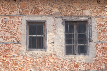 Fototapeta na wymiar Old brick wall with a window, old masonry, remake.