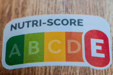 Close-up Nutri-Score E label on food packaging giving information on nutritional quality

