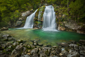 Fototapeta na wymiar The Virje waterfall in Bovec, Slovenia.