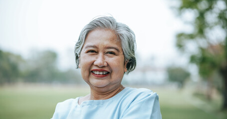 portrait of adult asian woman smiling with happiness