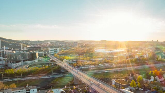 Time lapse cars speeding on highway among sunny Untertuerckheim district, Stuttgart, Germany

