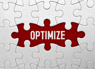 Fototapeta premium Word OPTIMIZE on red puzzle background