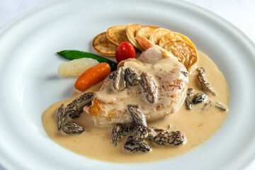 Famous and traditional chicken with morels