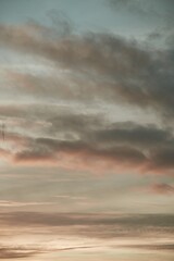 Fototapeta premium Sunset sky. The sunrise is decorated with clouds in various shapes