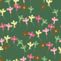 seamless mixed colourful tiny flowers pattern on green background for fashion fabric