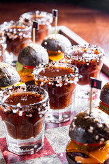 Drunken checkers. checkers with shot alcoholic drinks and mini burgers